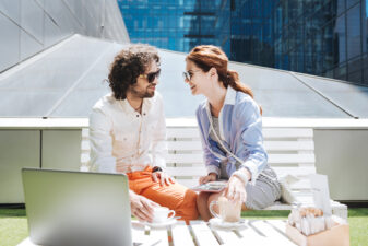 woman and man talking at a picnic