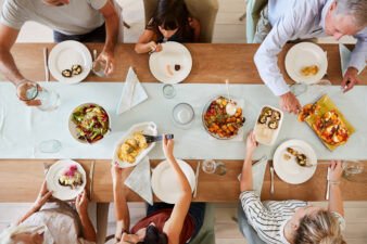 birdseye view of a family eating dinner together