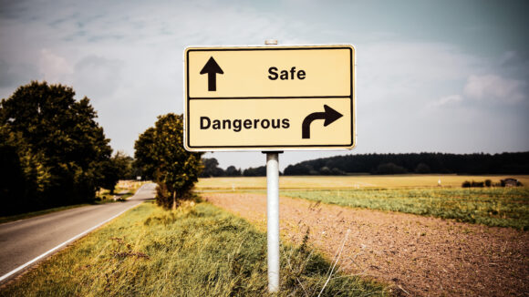 safety vs dangerous street sign