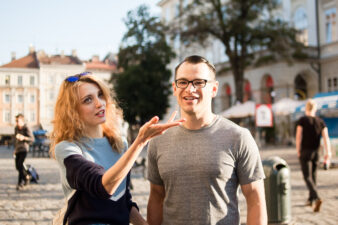 woman gesturing to a man