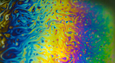 Soap bubble abstraction very close with movement and different colors