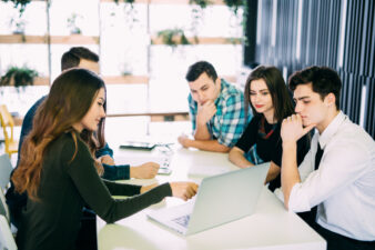 Young group of people discussing business plans