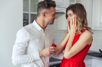 Man giving his girlfriend a Valentine
