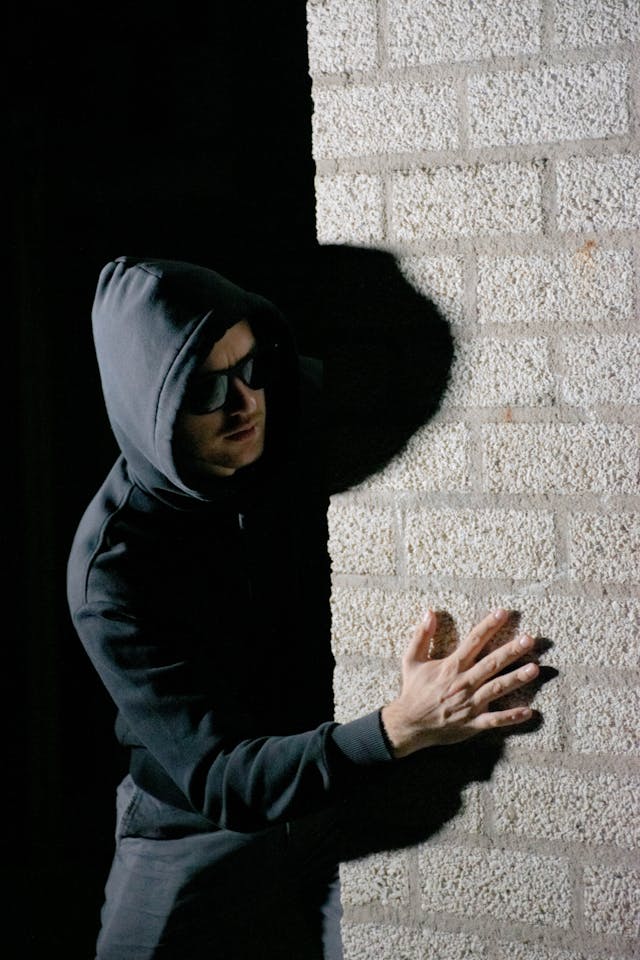 Burglar breaking into home