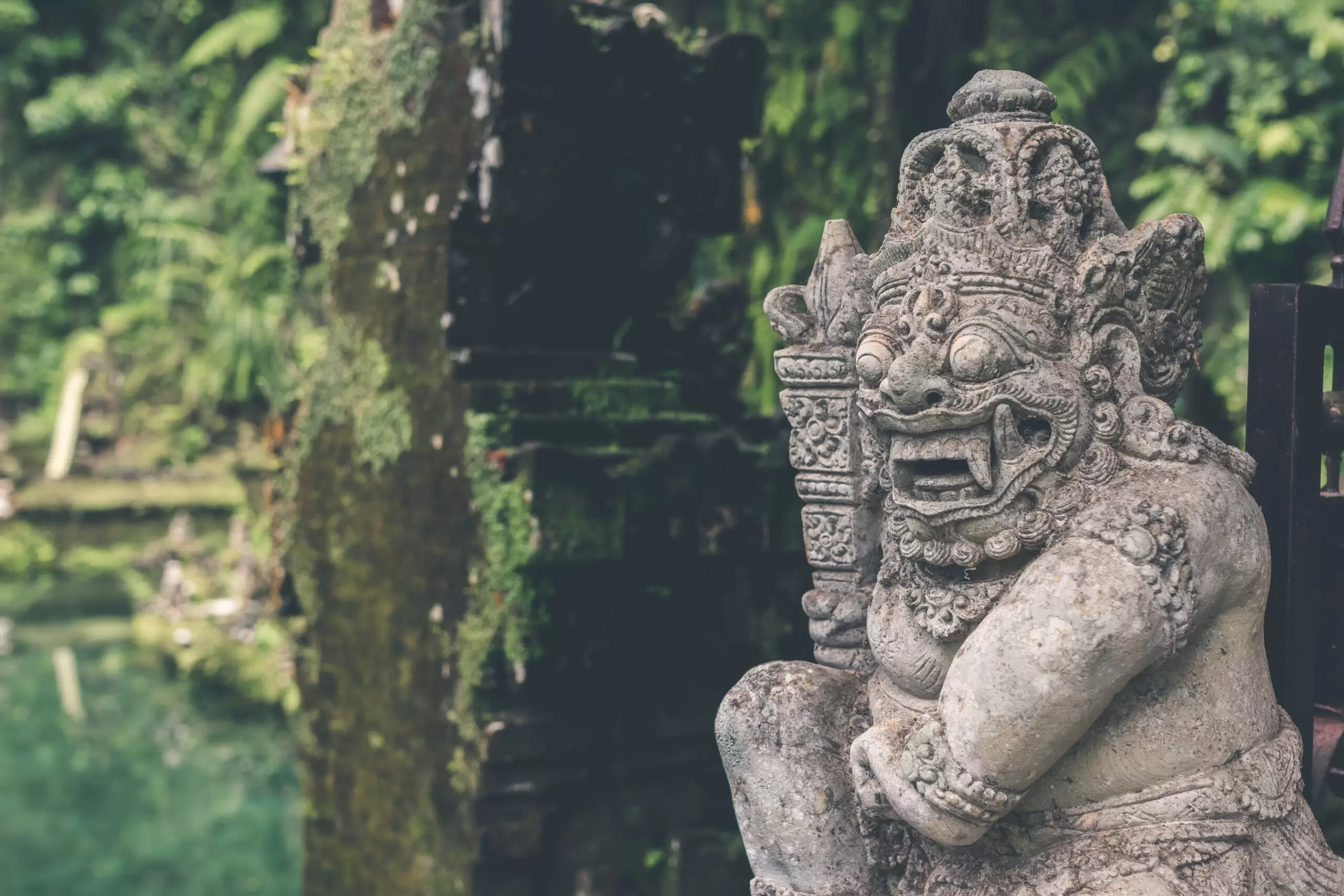 Hindu stone statue in the balinese temple. Tropical island of Bali, Indonesia