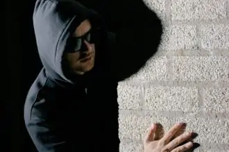 Burglar breaking into home